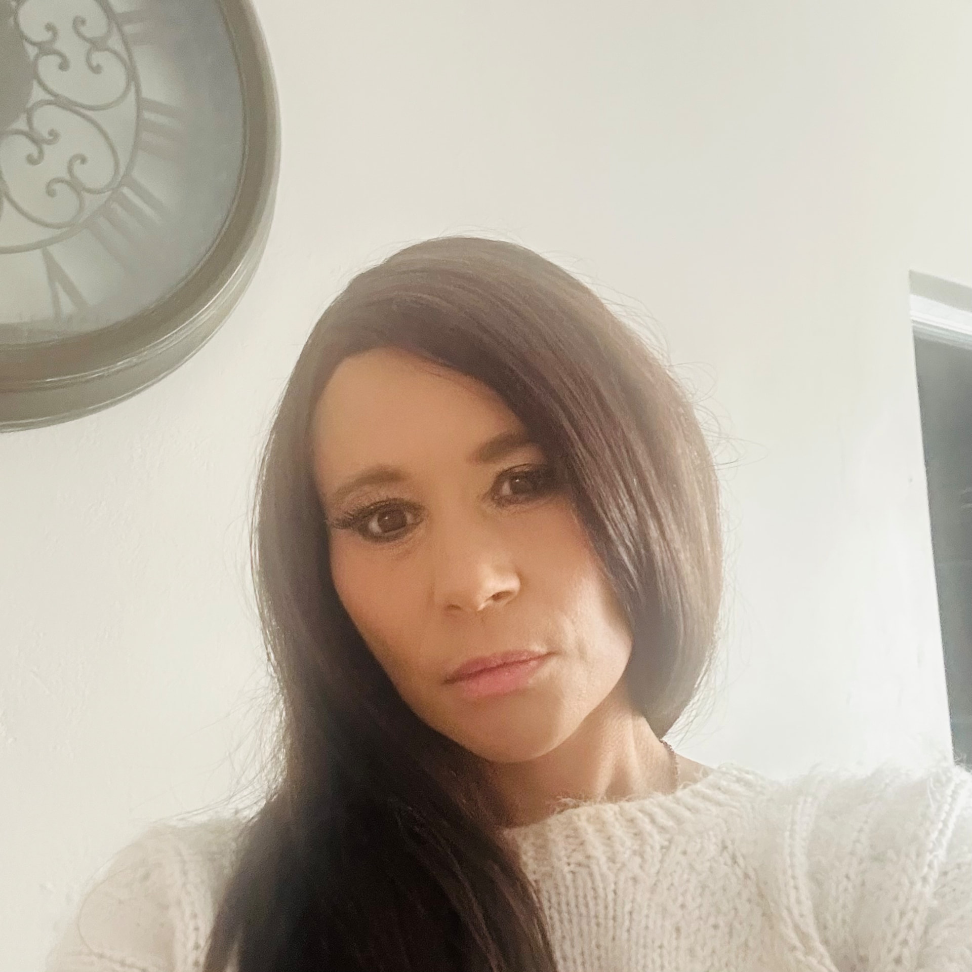 Close portrait of Cass with soft Victoria Beckham-style contouring