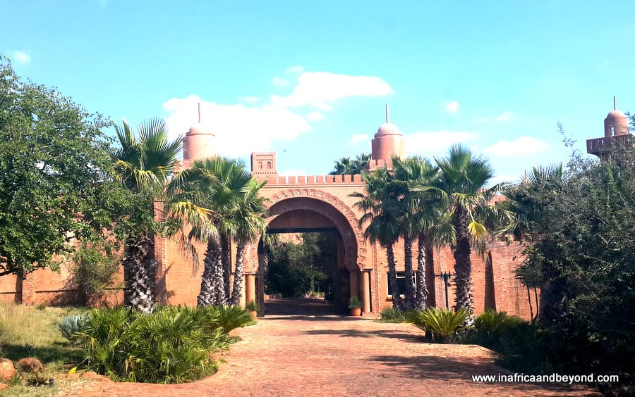The Moorish-inspired entrance of The Orient Hotel in Elandsfontein, framed by palms and gardens
